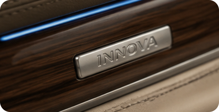 Front angle of Toyota Innova luxury taxi in Delhi