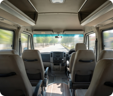 Interior view of luxury tempo traveller seats in Delhi